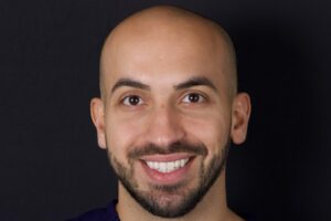 Headshot of Dr. Zaid Mohammad, dentist and owner of Ideal Modern Dentistry, smiling warmly.